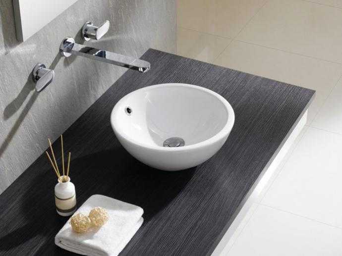 Накладная раковина на столешницу для ванной комнаты: виды, монтажные инструкции