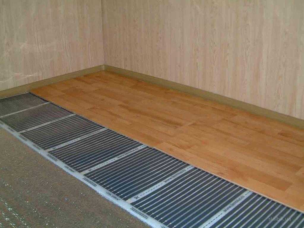 Теплый пол под ламинат на бетонный пол — какой выбрать и как уложить
