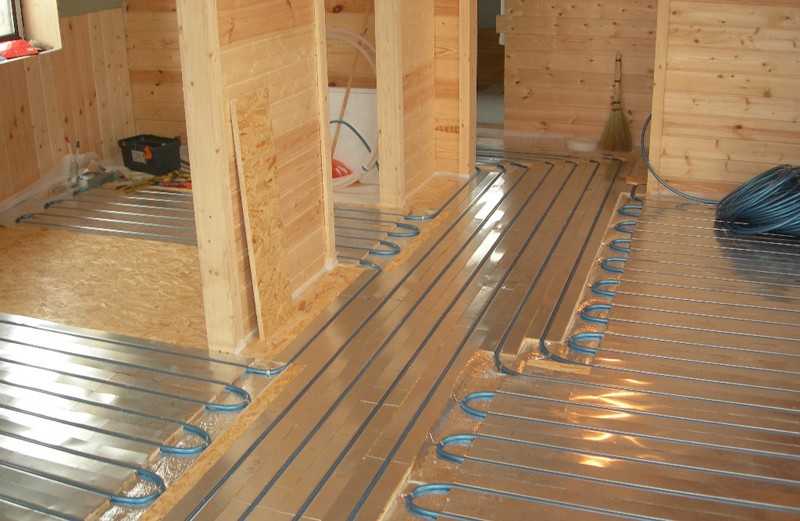 Монтаж водяного теплого пола на деревянный пол — варианты устройства, инструкция